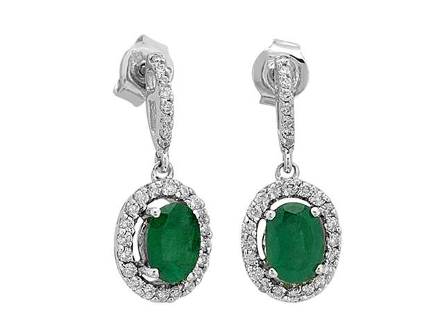 Diamond and oval emerald earrings in 14 carat white gold