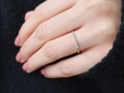 0.09 carat diamond 9 stone alliance in 333 8K yellow gold