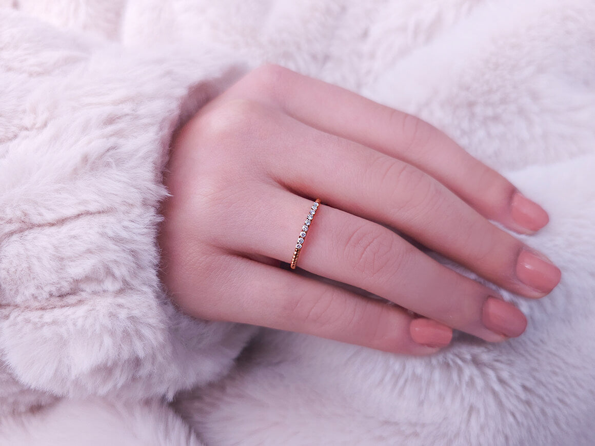 0.09 carat diamond 9 stone alliance in 333 8 K red gold