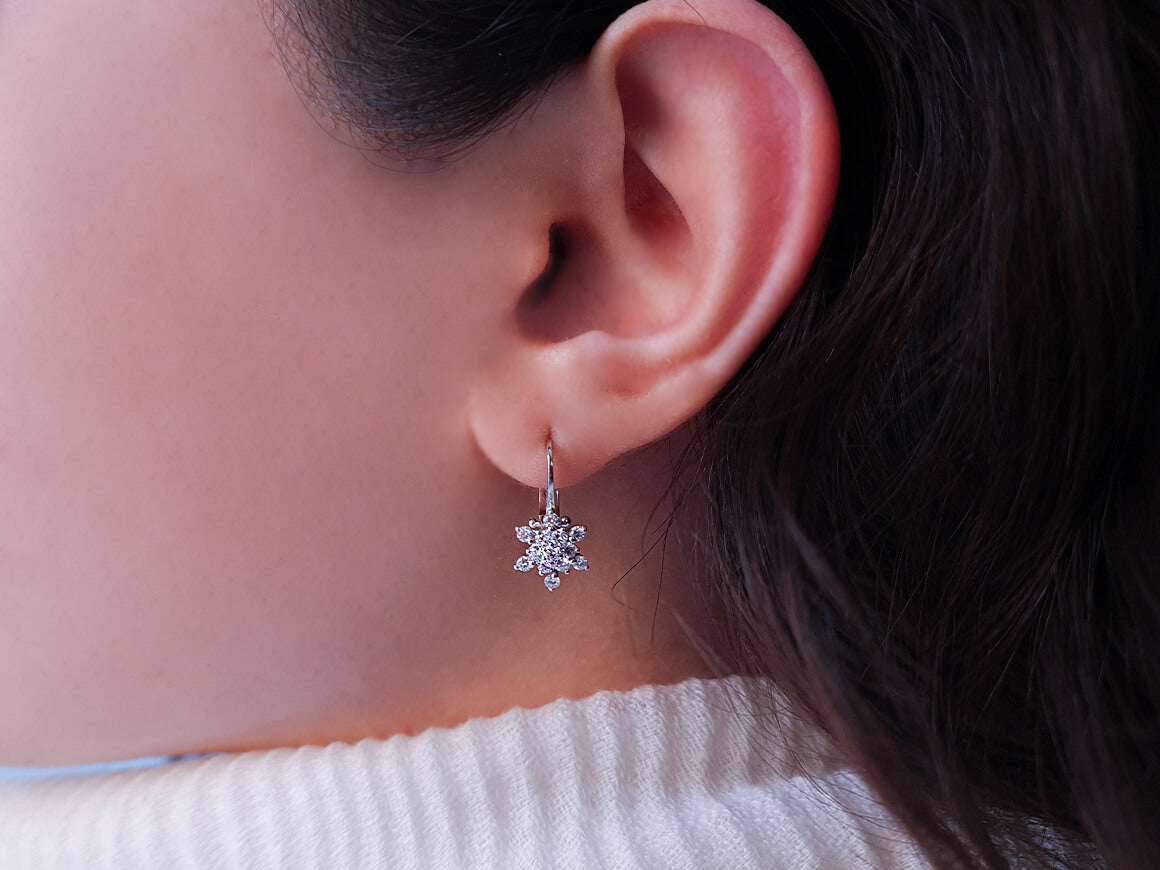 0.63 carat diamond Antares star earrings in 750 18 carat white gold