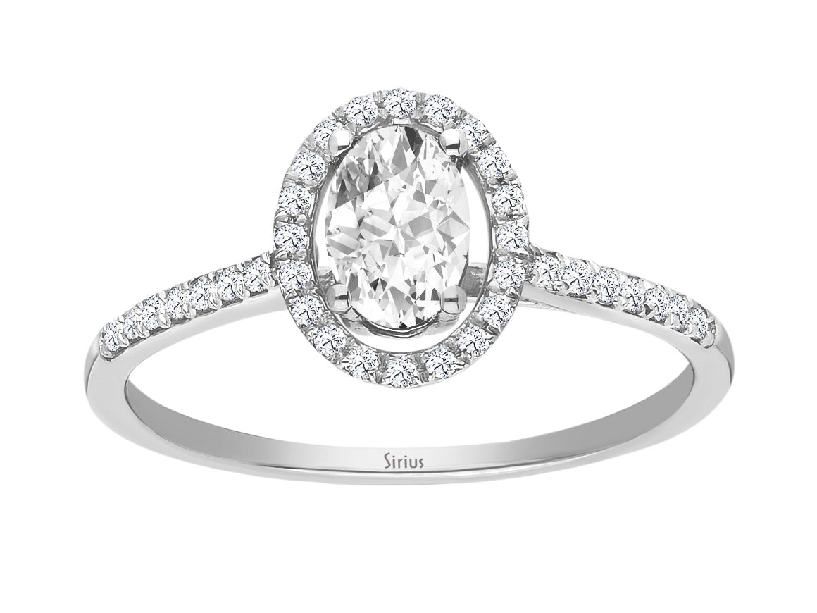 Arusha ring with diamonds and oval white topaz