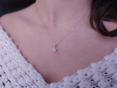 Diamond crocus flower jewelry set in 14 carat white gold.