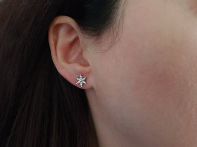 Diamond crocus flower jewelry set in 14 carat white gold.