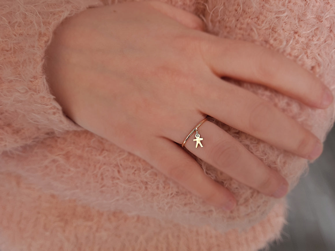 Bague en forme de bonhomme allumette en diamant