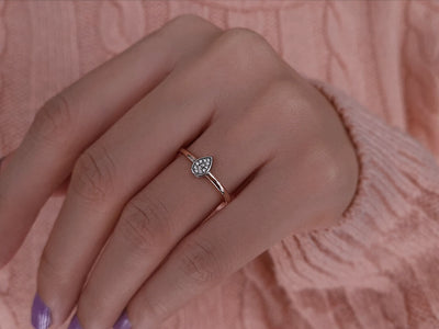 Total 0.10 carat drop diamond ring