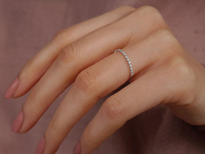 0.07 carat diamond half-round alliance
