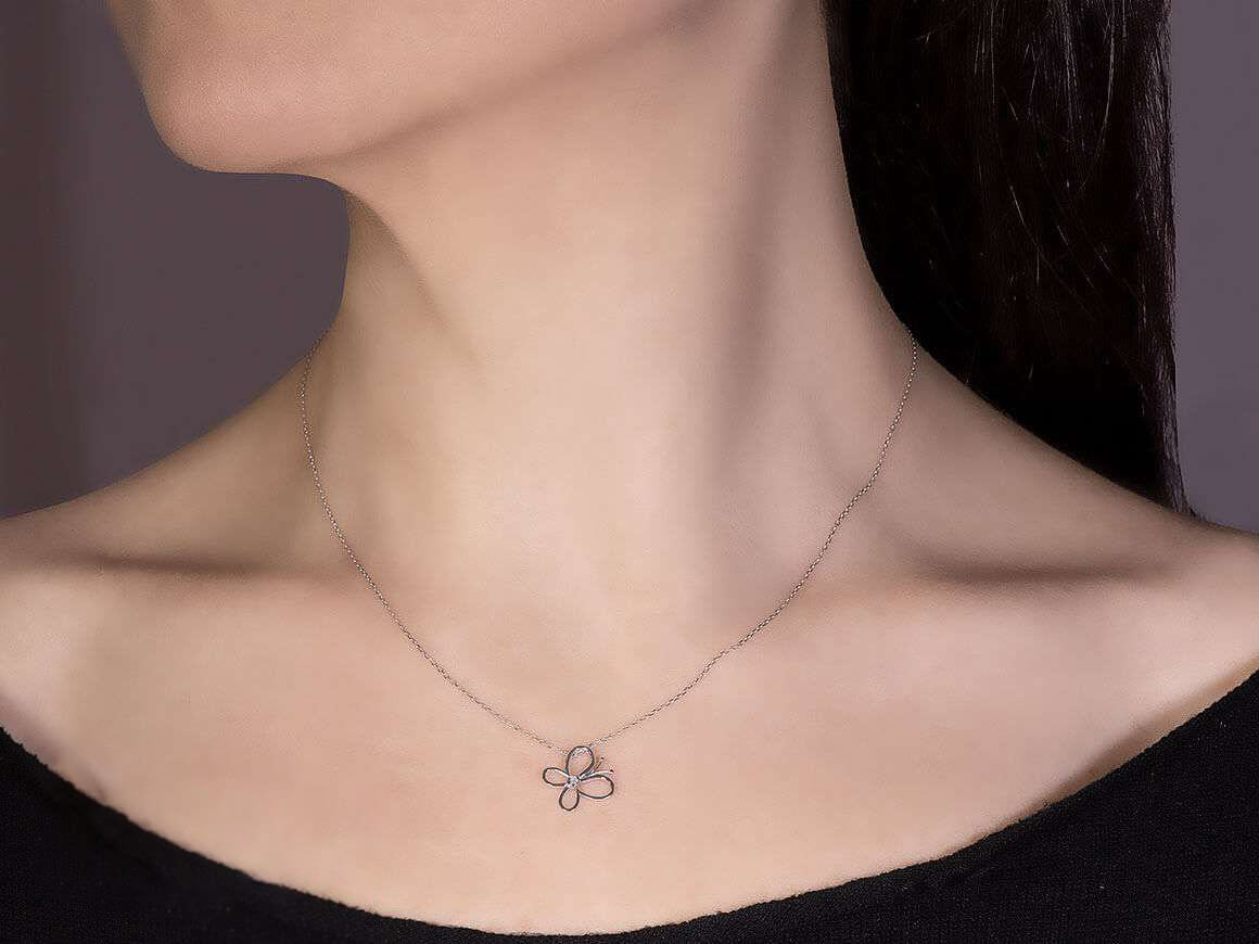 Diamond butterfly necklace in 8 K white gold