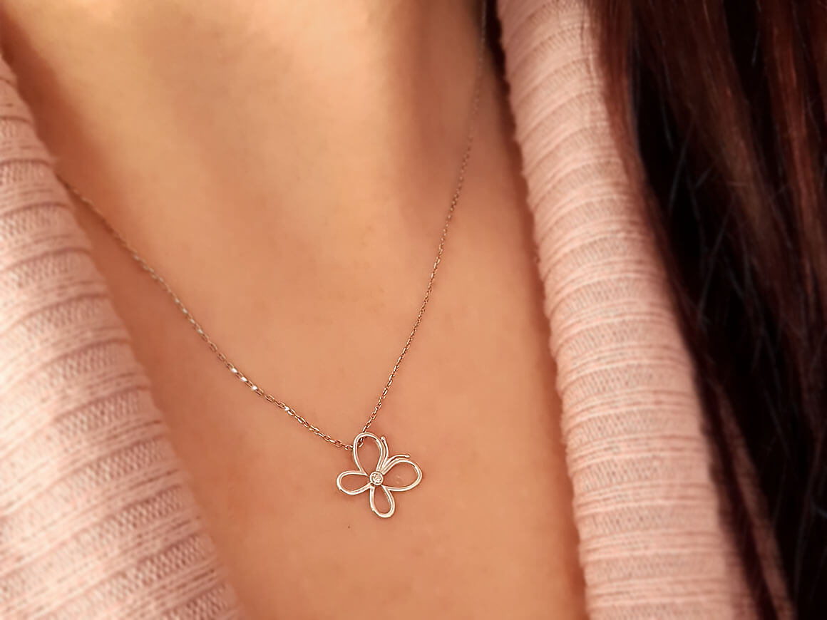 Diamond butterfly necklace in 8 K white gold