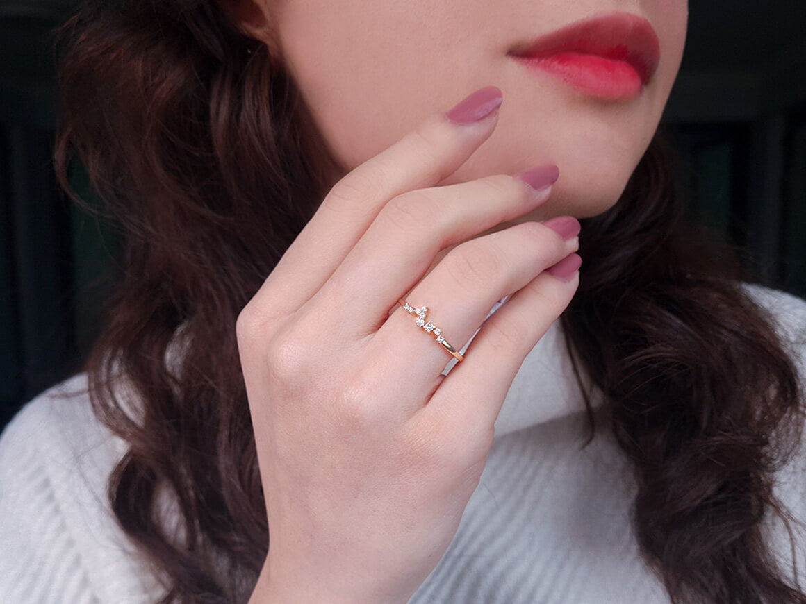 Minimalist half-round ring with diamonds