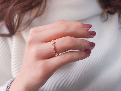 Minimalist half-round ring with diamonds