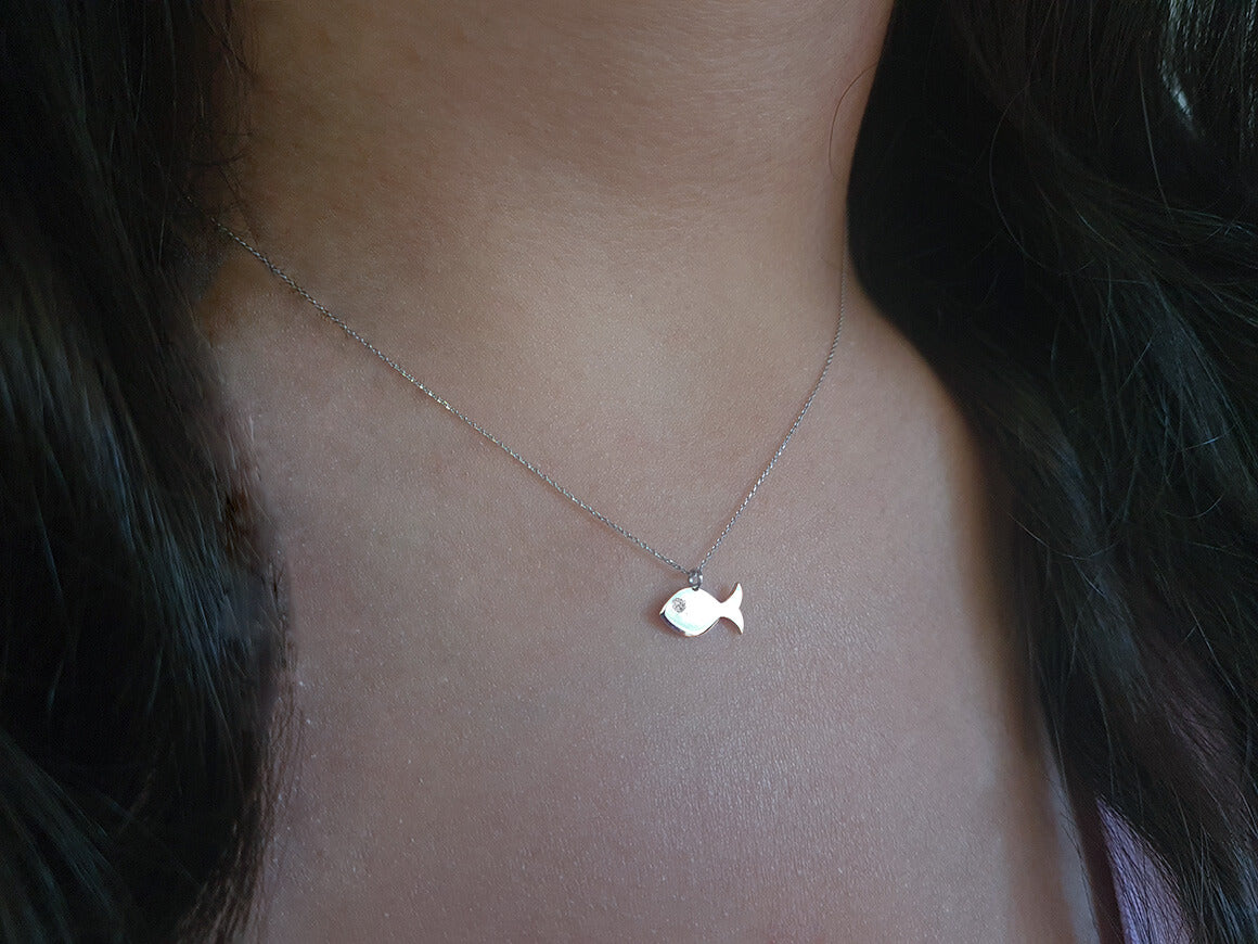 0.01 carat diamond fish necklace in 585 14 carat white gold