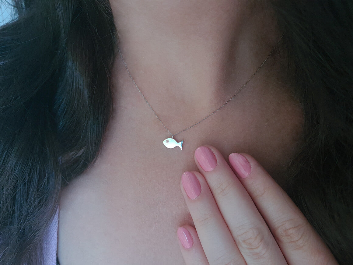 0.01 carat diamond fish necklace in 585 14 carat white gold
