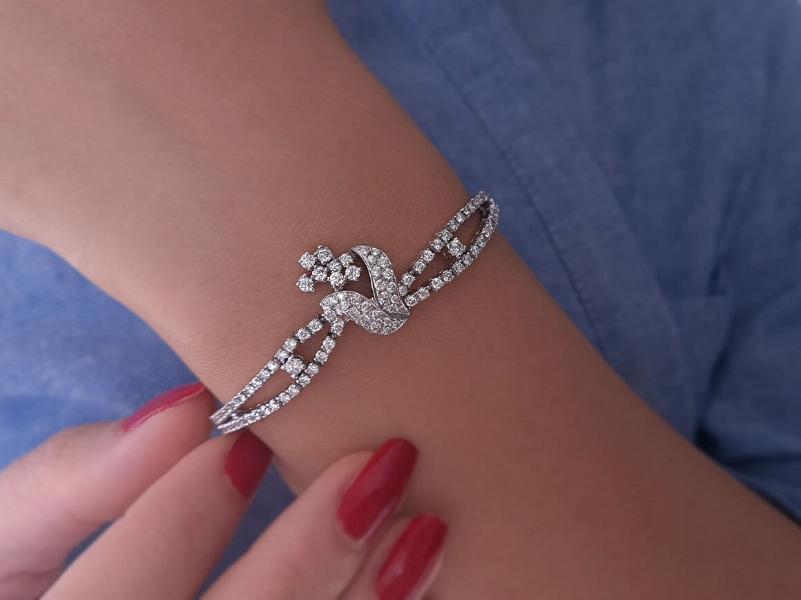 Bracelet tennis en or blanc 14 carats avec diamants de 2,30 carats au total