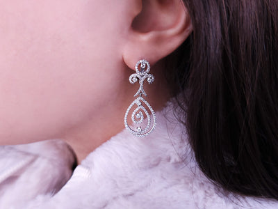 Total 1.63 carat diamond earrings in 14K