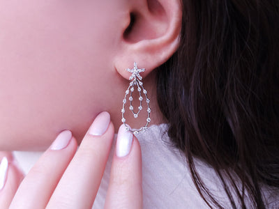 0.91 total carat diamond drop earrings in 585 14 carat white gold