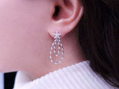 0.91 total carat diamond drop earrings in 585 14 carat white gold