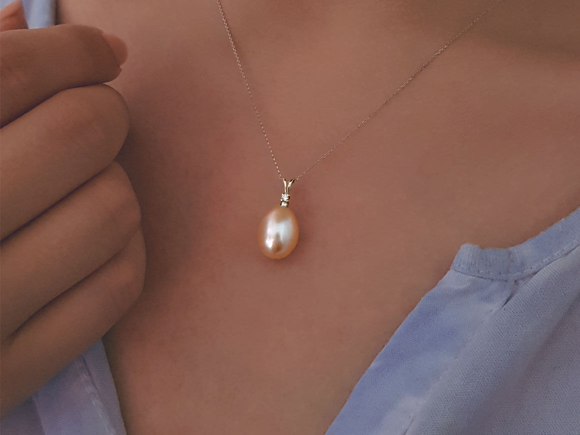 0.02 carat diamond and drop pink pearl necklace in 14K white gold