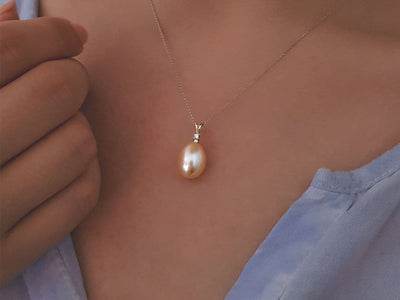 0.02 carat diamond and drop pink pearl necklace in 14K white gold