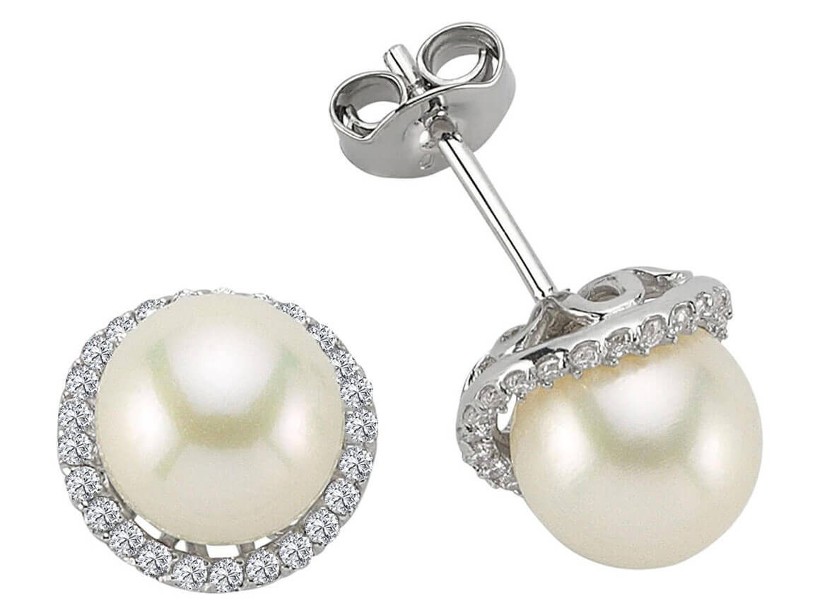 Diamond and natural pearl earrings in 14 K white gold
