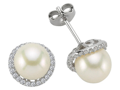 Diamond and natural pearl earrings in 14 K white gold