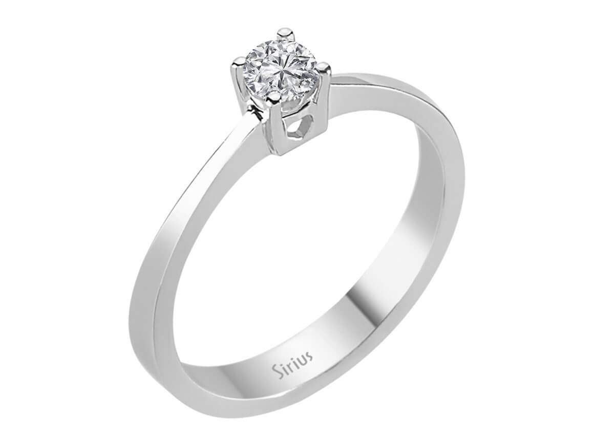 0.17 carat diamond heart motif solitaire ring in 18K white gold