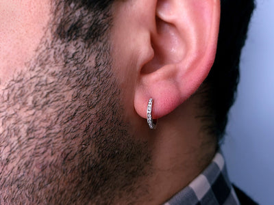 0.10 carat diamond men's earrings in 14 K white gold