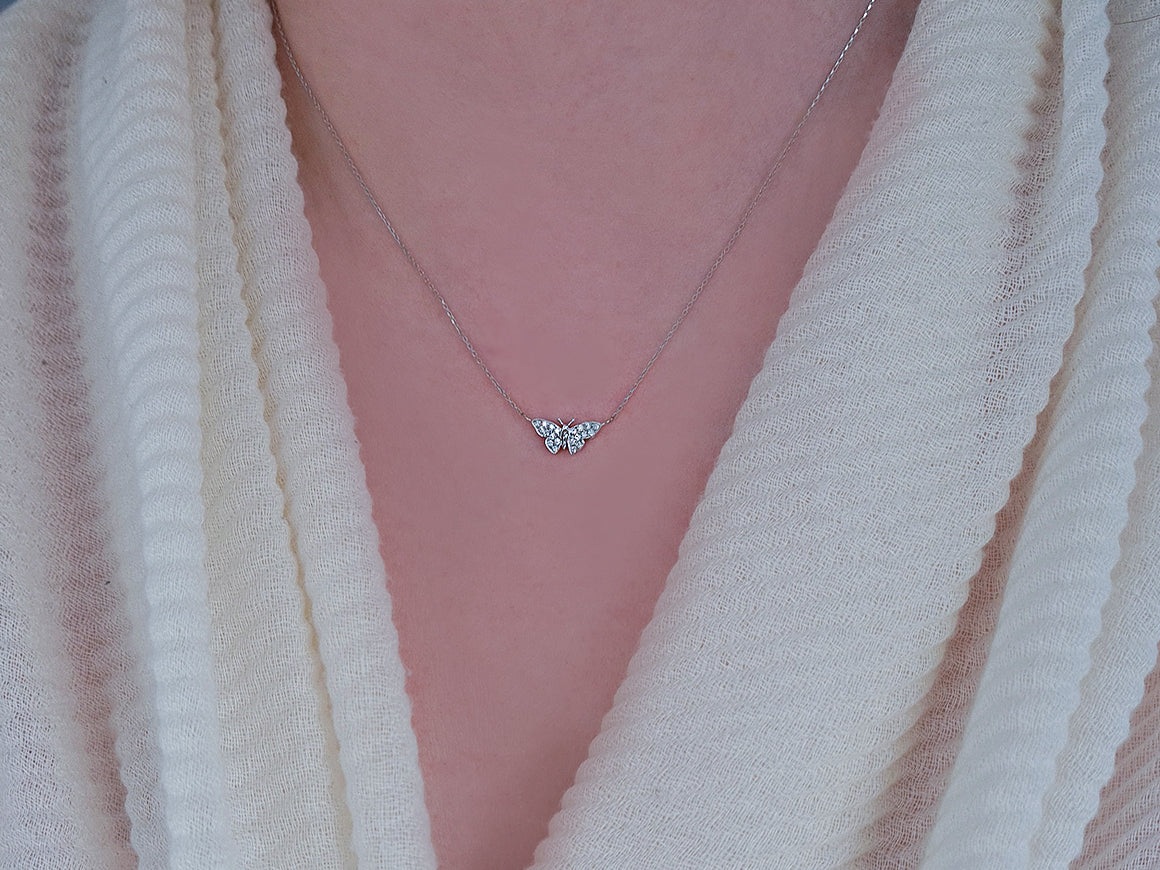 Diamond butterfly necklace in 333 8 carat white gold