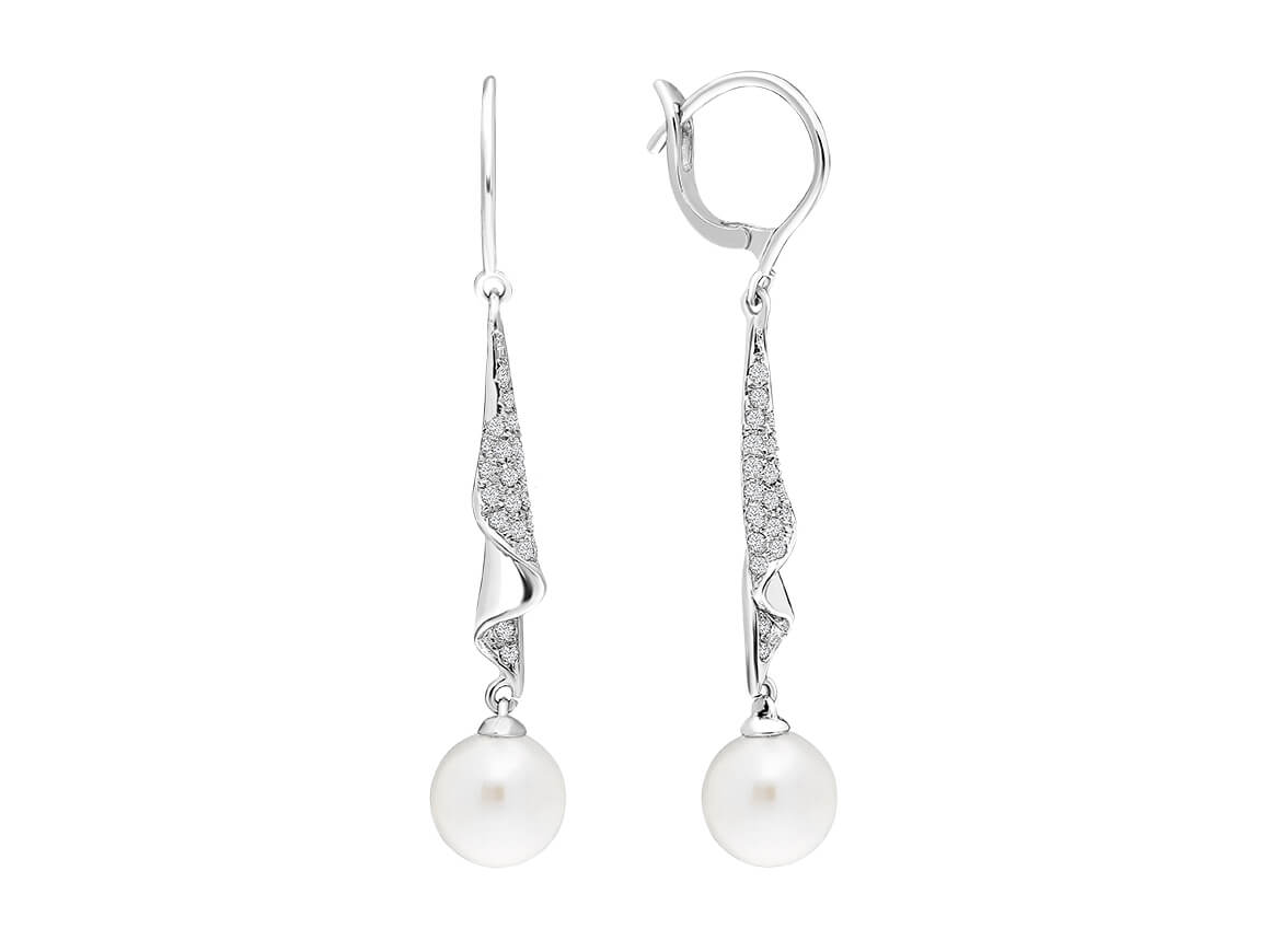 Diamond and natural pearl earrings in 14 carat white gold