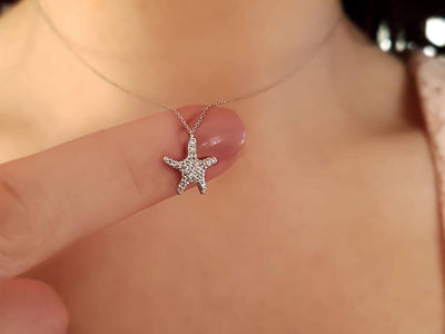 Diamond starfish necklace in 18K white gold