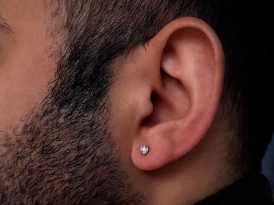 0.19 carat diamond men's earring in 585 14 carat white gold
