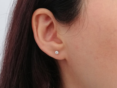 0.24 carat diamond solitaire stud earrings