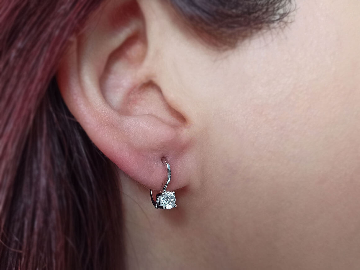0,62 Karat Diamant Solitär Ohrringe - handgefertigter Diamantschmuck aus Feingold | Sirius Diamant