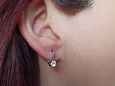 0.62 carat diamond solitaire earrings