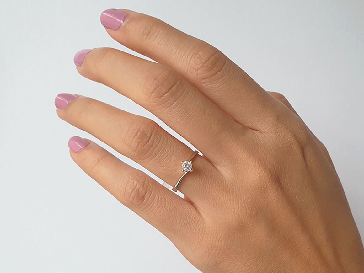 0.24 carat diamond solitaire ring in 14K white gold