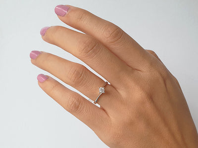 0.24 carat diamond solitaire ring in 14K white gold