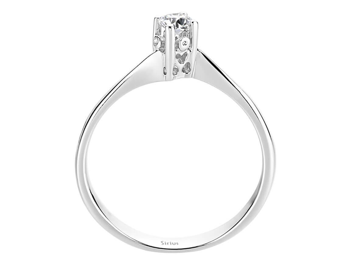 0.14 carat diamond solitaire ring in 18 K white gold