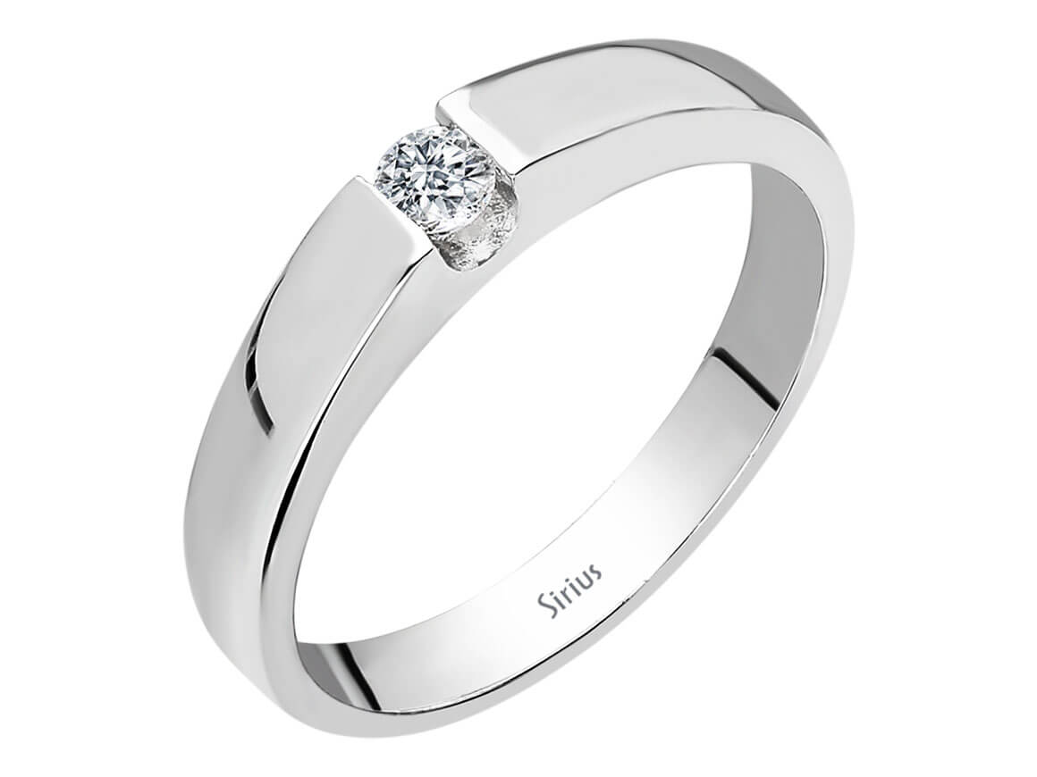 0.11 carat diamond solitaire ring in 14 K white gold