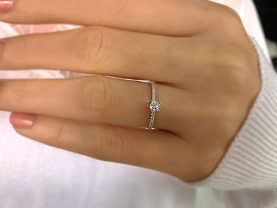 0.23 total carat diamond solitaire ring in 14 K white gold