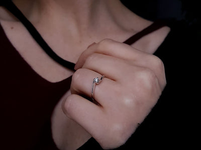 G color 0.11 carat diamond solitaire ring