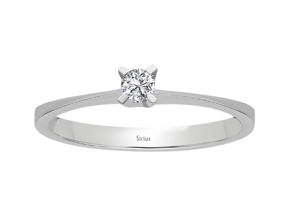 0.10 carat diamond solitaire ring in 8 K white gold