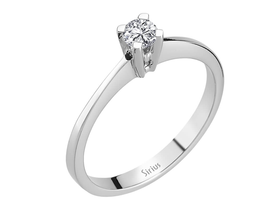 0.22 carat diamond solitaire ring in 14 K white gold