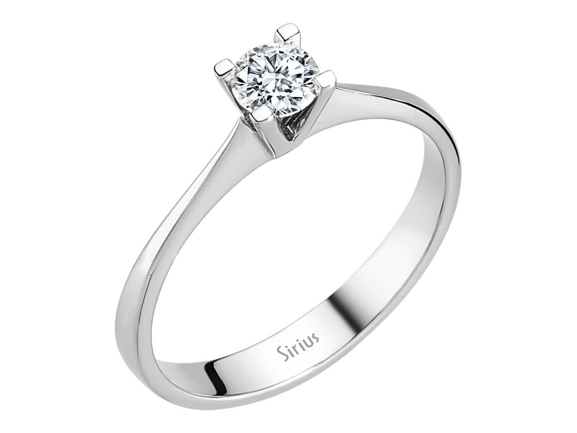0.30 carat diamond solitaire ring in 14 K white gold