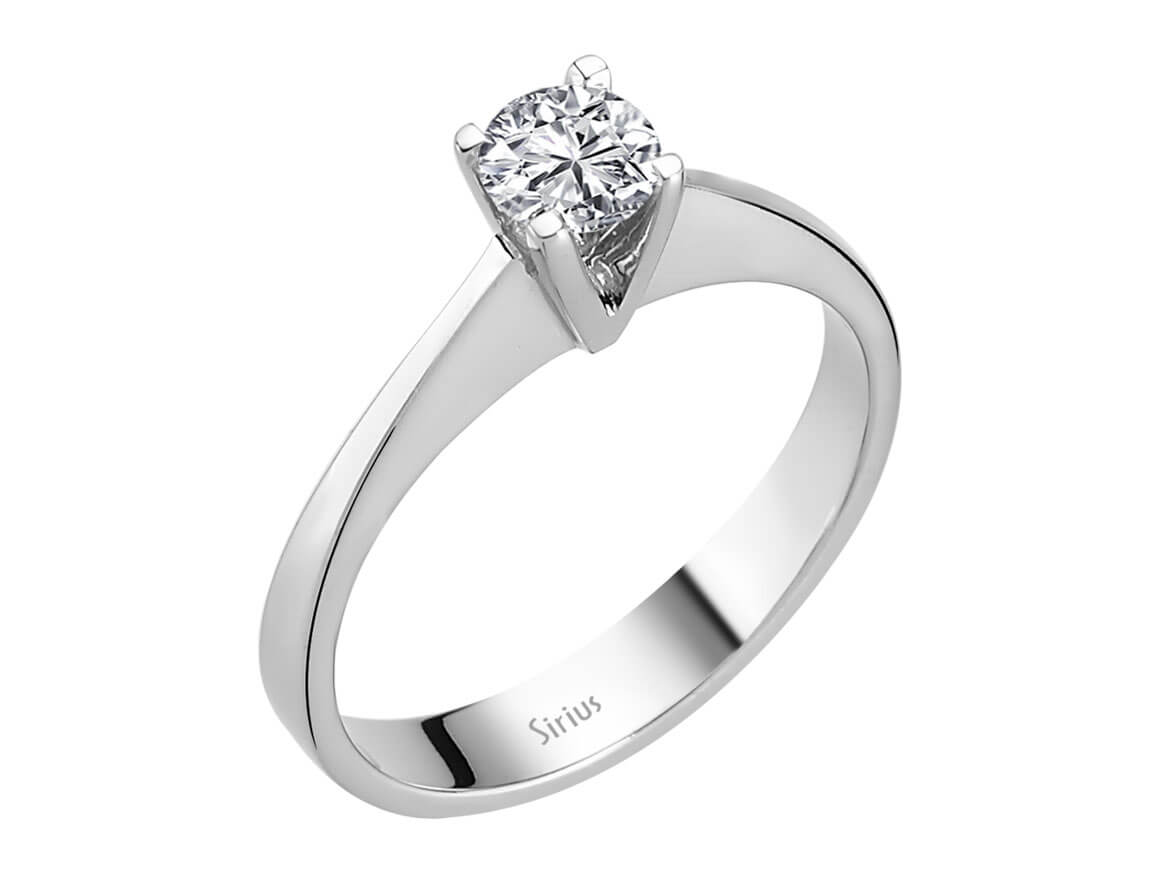 0.47 carat diamond solitaire ring in 14 K white gold