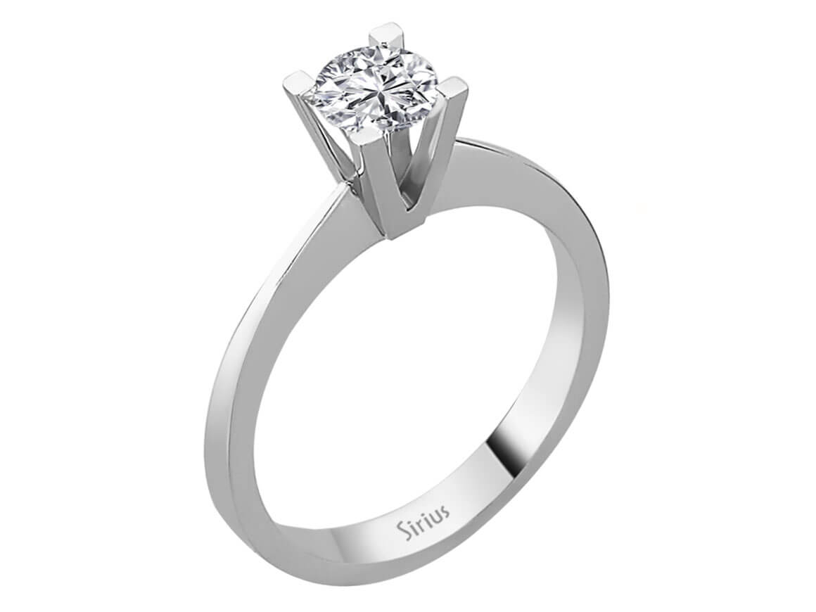 0.54 carat diamond solitaire ring in 14 K white gold