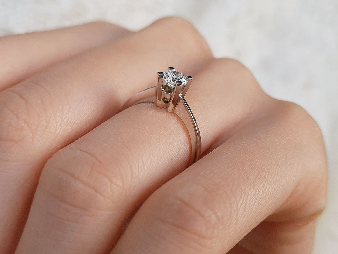 0.53 carat diamond solitaire ring in 18K white gold