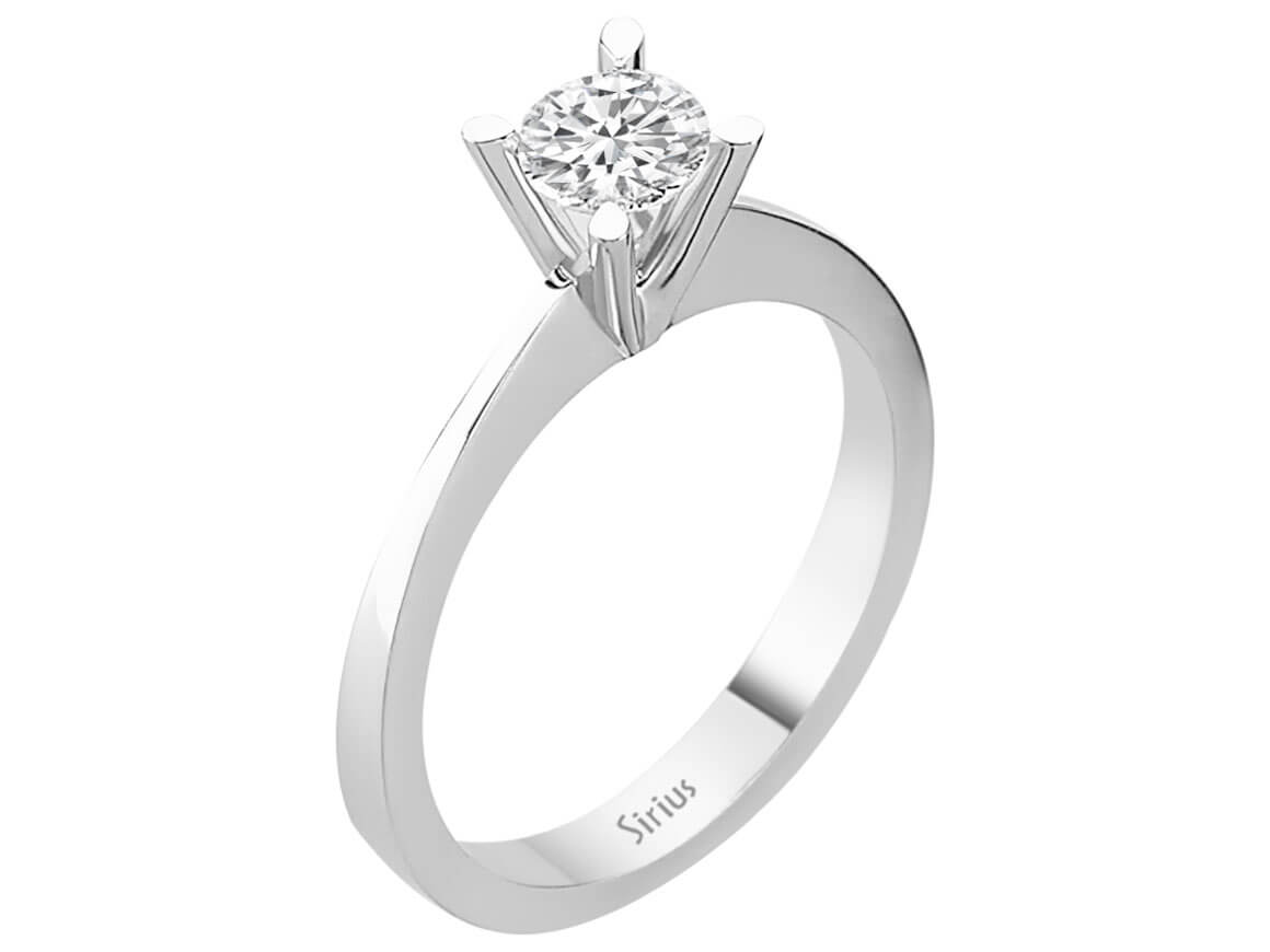 0.52 carat diamond solitaire ring in 14 K white gold