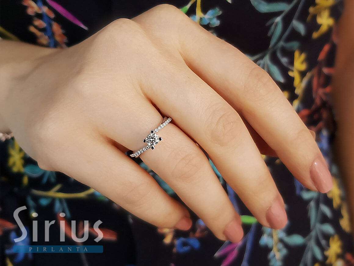 0.46 carat diamond solitaire ring in 14 K white gold