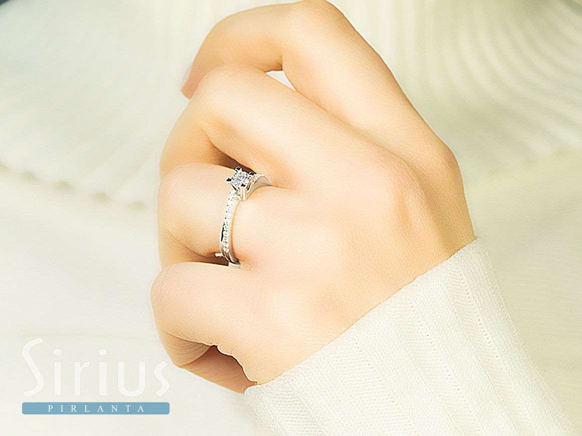0.46 carat diamond solitaire ring in 14 K white gold