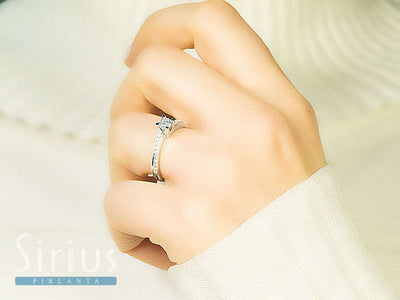 0.46 carat diamond solitaire ring in 14 K white gold