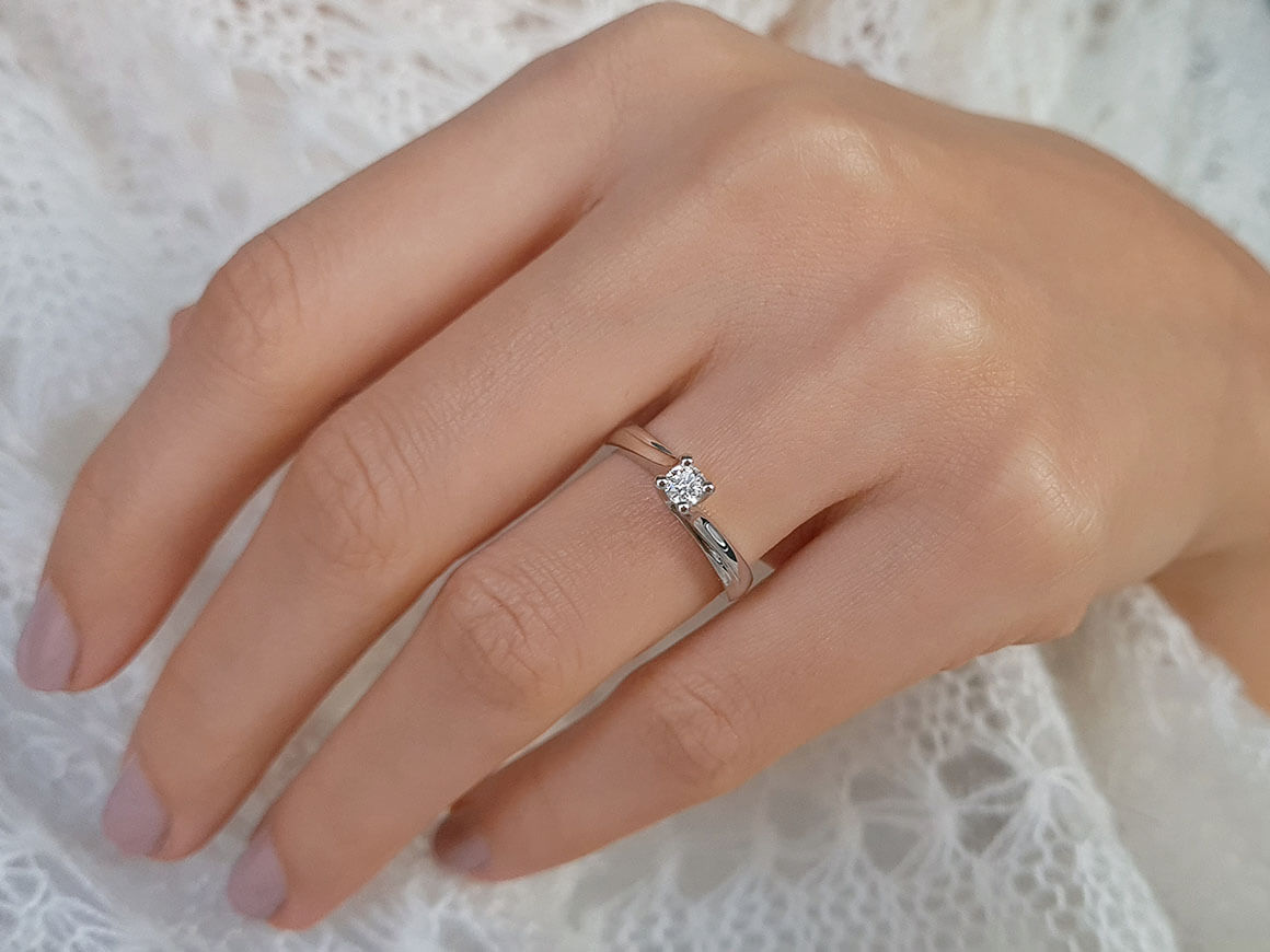 Bague solitaire en diamant de 0,18 carat